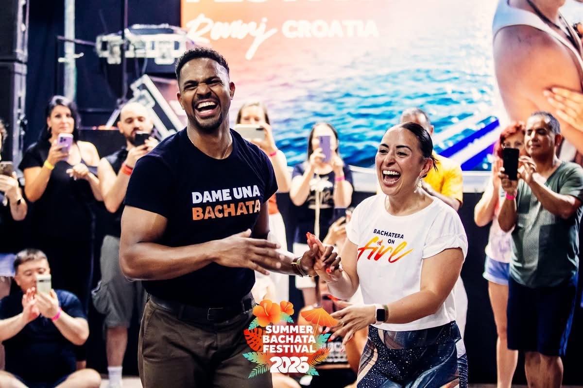 Junior and Carolina laughing with their students
